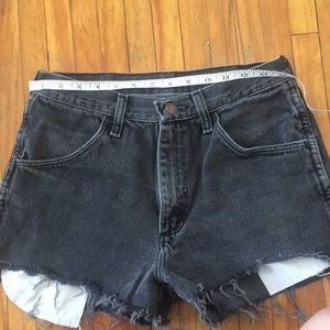 Dark grey high waisted denim shorts.